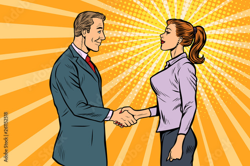man and woman businessman handshake