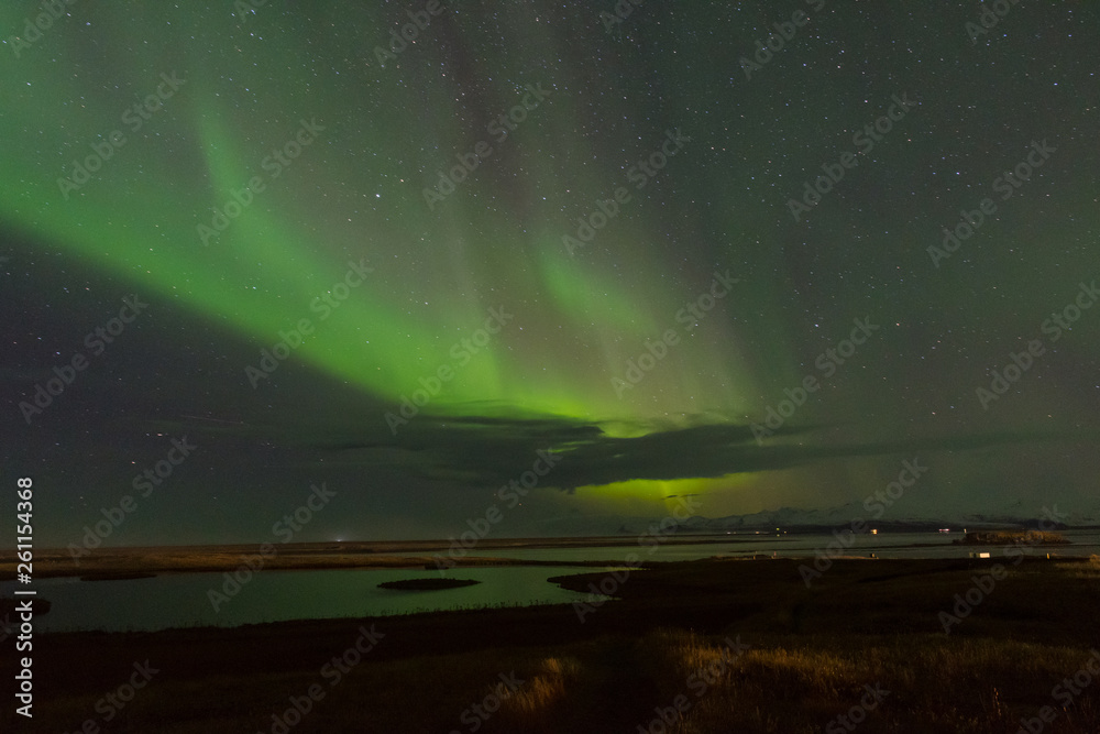 Aurora Borealis in icelandic countryside area of Hornafjordur