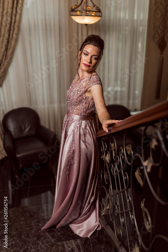 Young beautiful girl in pink luxury dress for the prom night © Kostadin