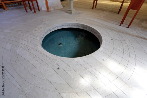 The baptismal font of St. Peter's Church in Eisleben photo