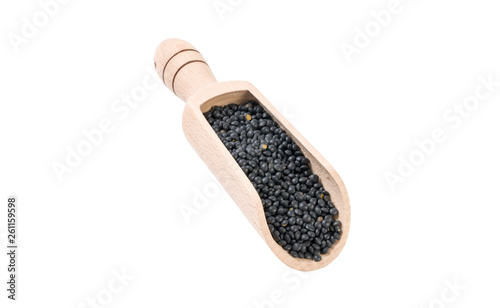 black lentils beluga  in wooden scoop isolated on white background. nutrition. bio. natural food ingredient.