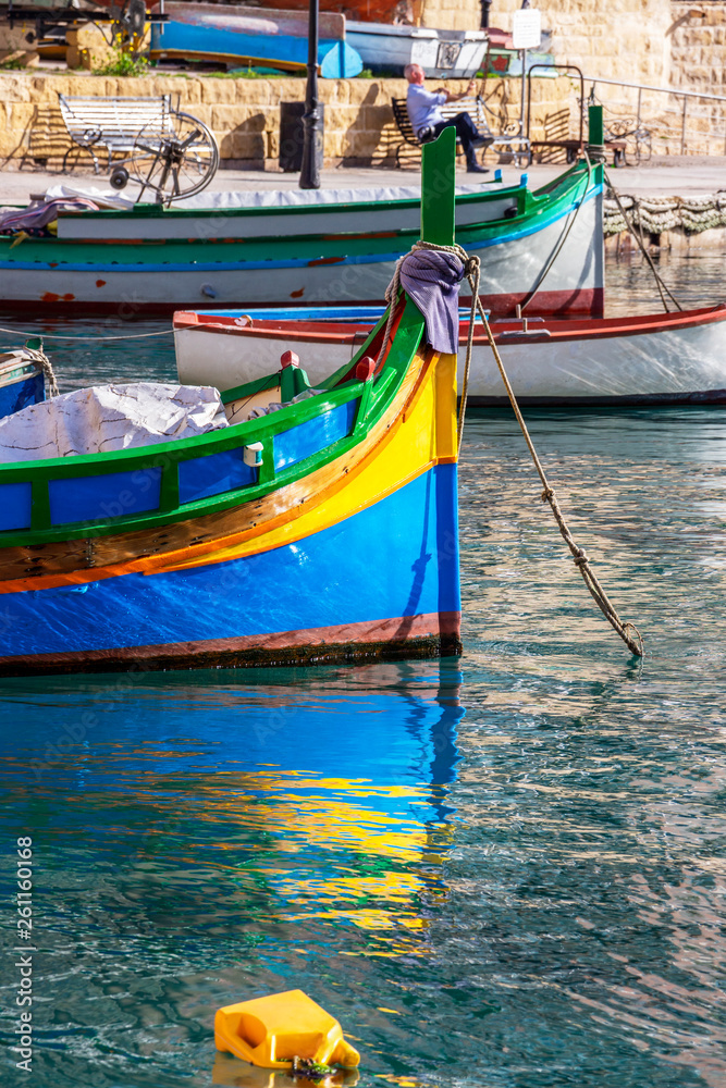 A Luzzu boat bow - the traditional Maltese fishing boat at Spinola Bay in St. Julian's, Malta