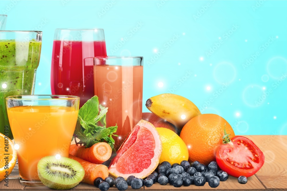 Fresh ripe healthy fruits and juices in glasses Fresh ripe healthy fruits and juices in glasses