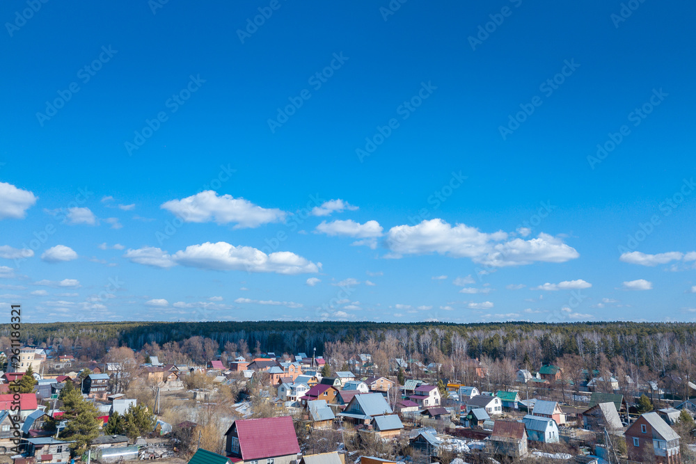 Aerial drone view of an old traditiona village in the forest, on background bly sky. Aerial drone view of an old traditiona village in the forest, on background bly sky.