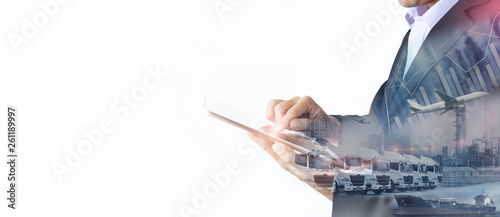 Fotografering Multiple exposures of overall shipping, transportation, and logistics concept with business man is using tablet to commard business with left free white space