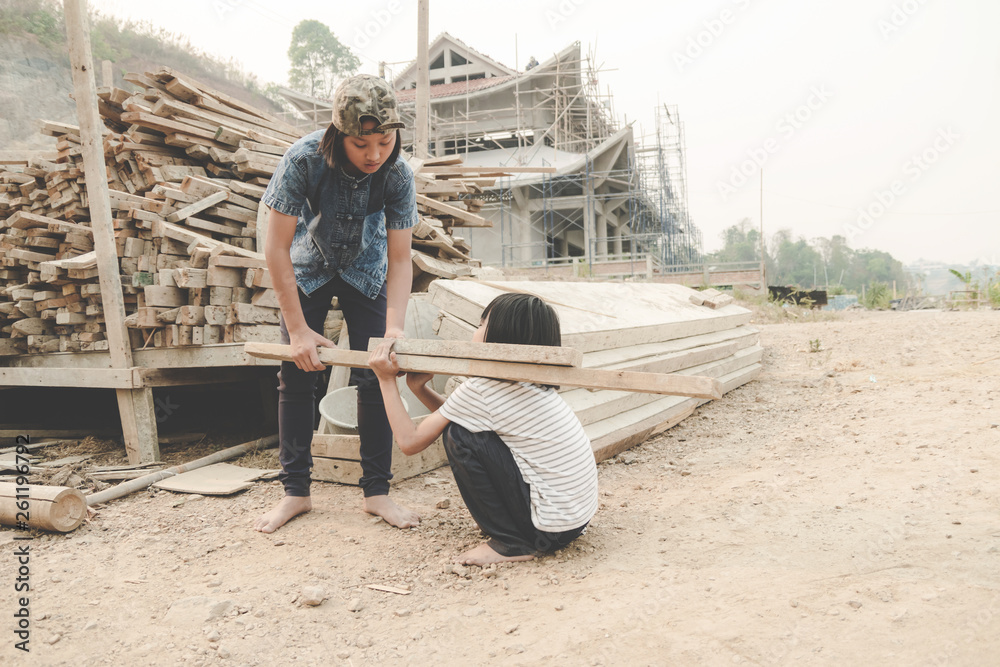 Child working in a brick factory. world day against child labour concept Child working in a brick factory. world day against child labour concept