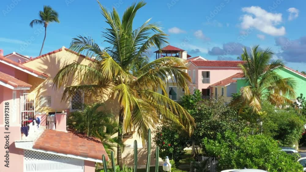 Aerial view from drone on caribbean house with coconut palm trees, tropical destination Aerial view from drone on caribbean house with coconut palm trees, tropical destination