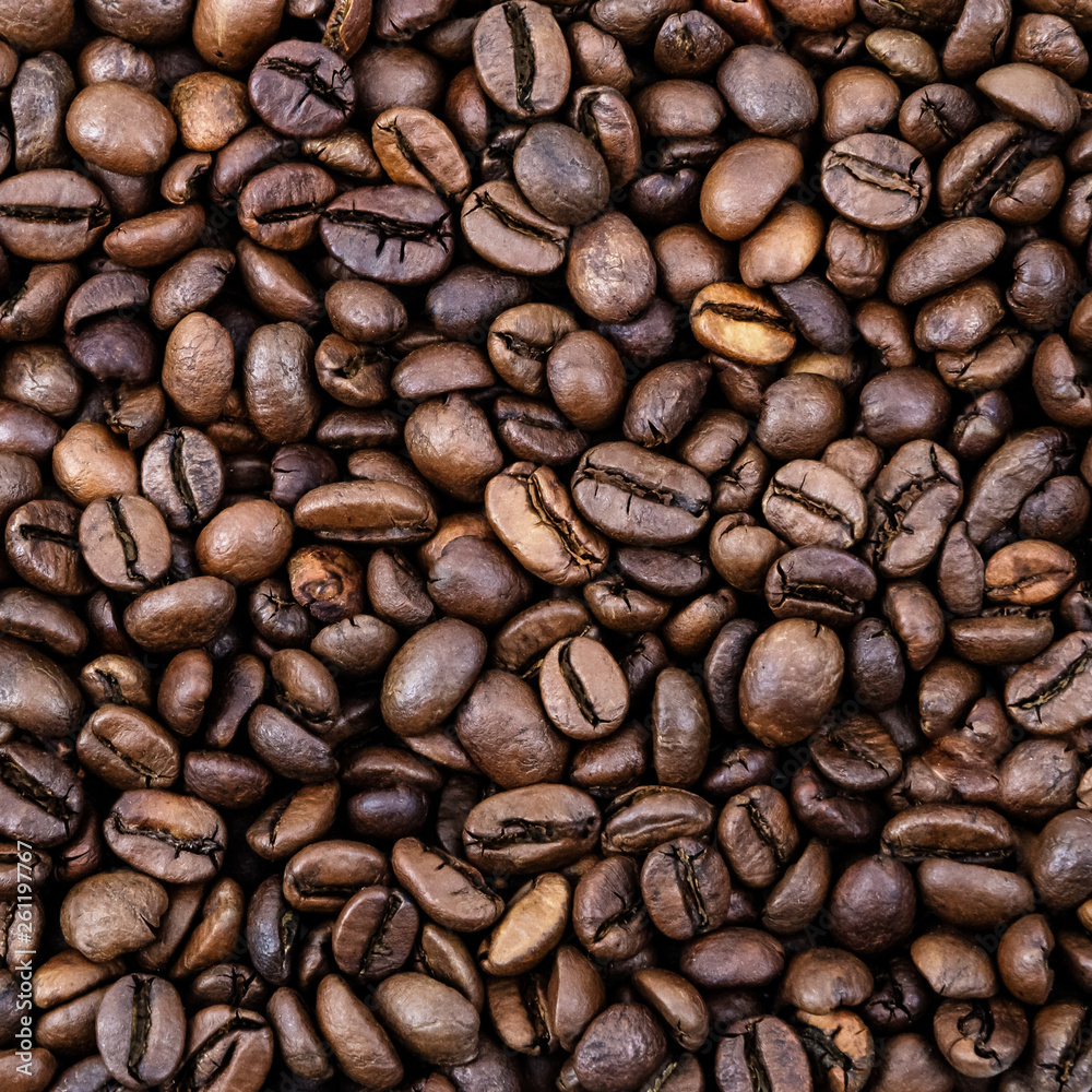Coffee grains. Background of roasted coffee beans brown. layout. Flat lay.