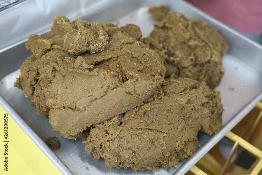 Amami Oshima, Japan - April 6, 2019: Unrefined brown sugar cane in Amami Oshima, Kagoshima, Japan Amami Oshima, Japan - April 6, 2019: Unrefined brown sugar cane in Amami Oshima, Kagoshima, Japan