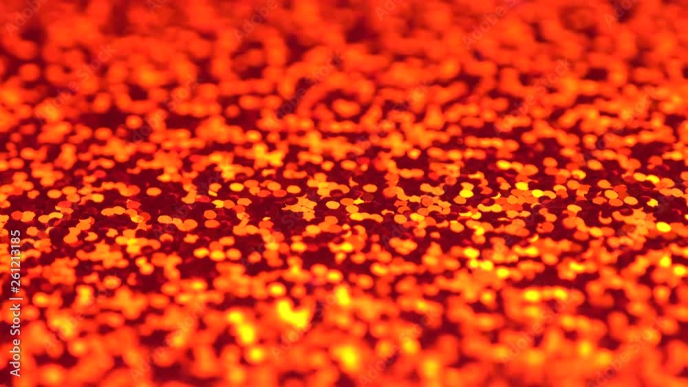 Festive red sparkle glitter dust particles rotating moving background with bokeh for holiday, flowing spinning loop movement, valentine day concept. UHD 4K video.