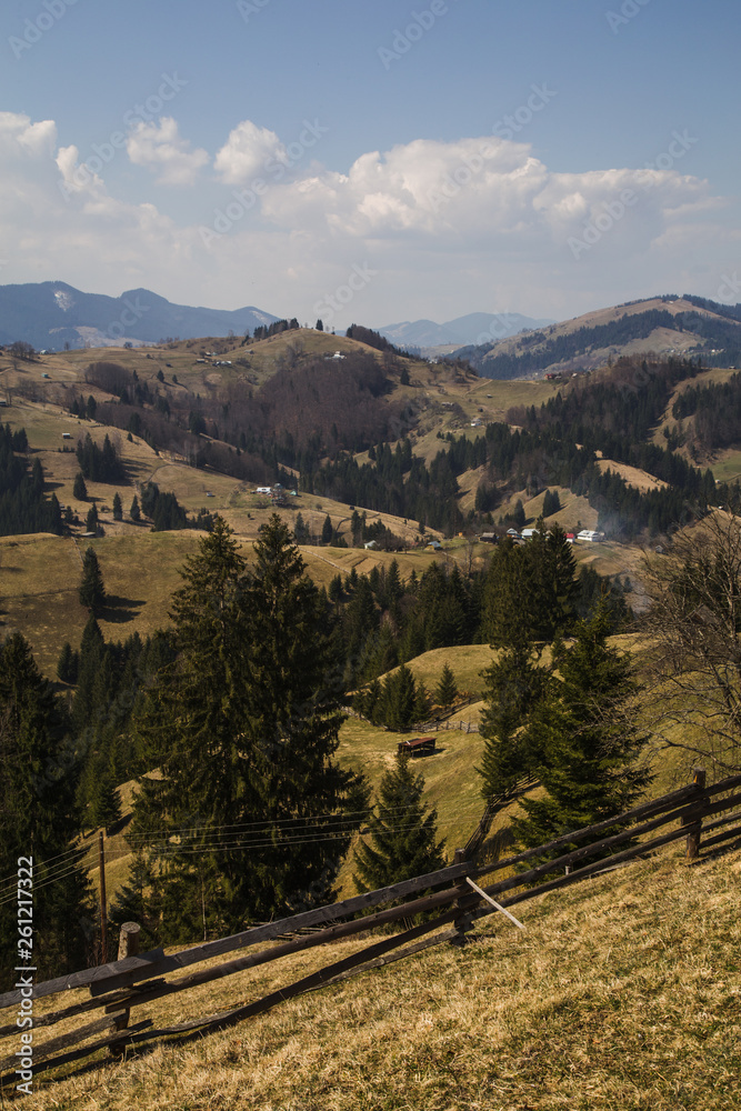 Naklejka premium Sunny landscape in wild mountains