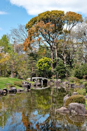 Traditional Japanese garden at Fujita house park in Osaka, Japan photo