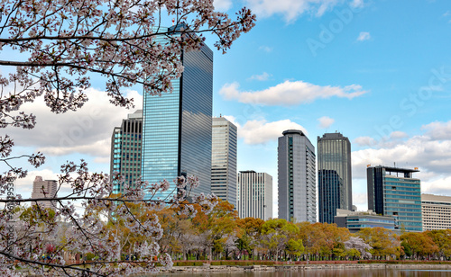 Office buildings along Okawa river in Osaka, Japan photo