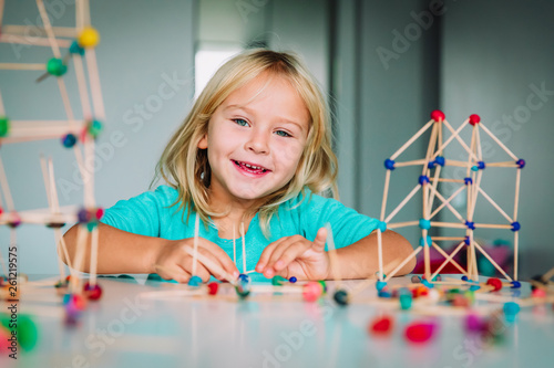 happy child making geometric shapes, engineering and STEM