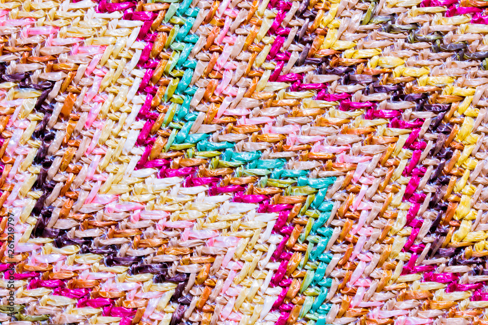 Abstract textured zigzag background of close up detail in woven raffia Abstract textured zigzag background of close up detail in woven raffia