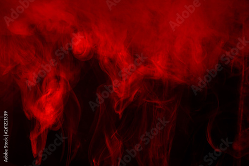 Red steam on black background
