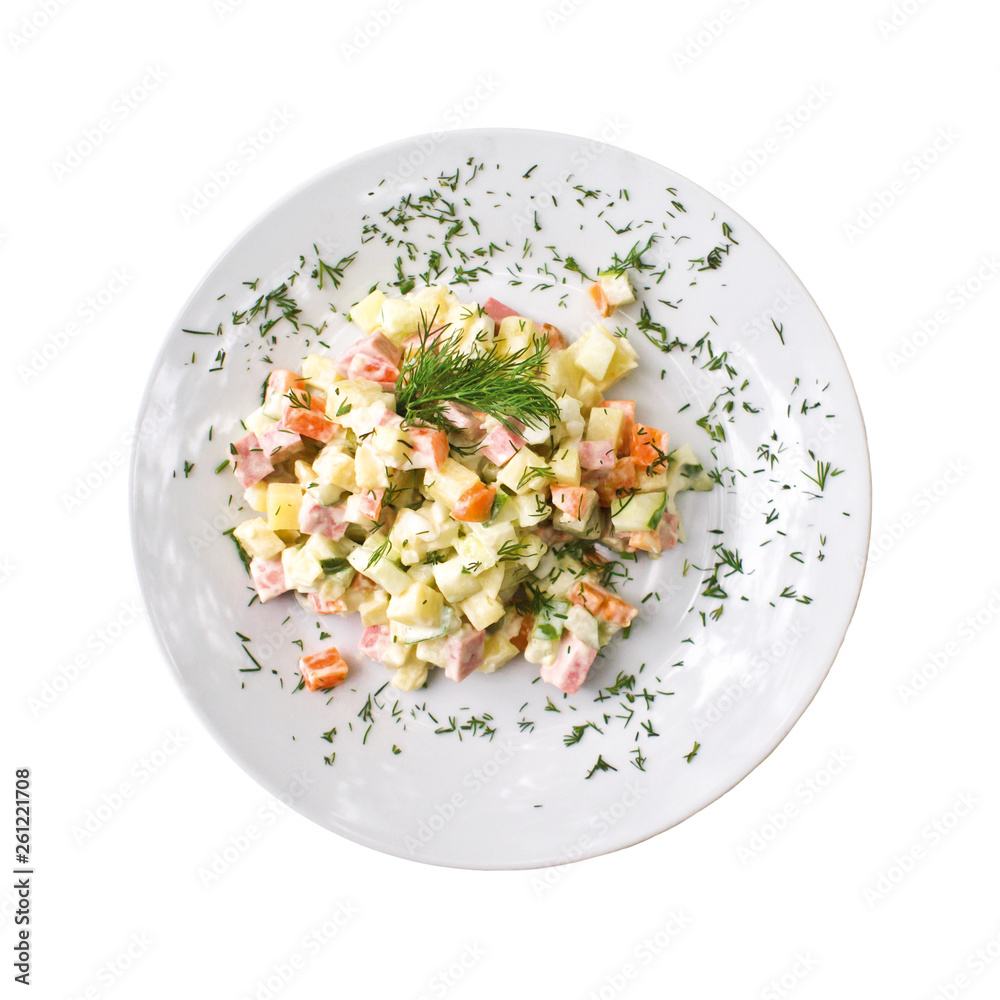 Olivier salad on a plate, isolated on white background. Top view