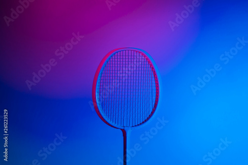 Badminton racket in vibrant bold gradient holographic neon colors © Augustas Cetkauskas