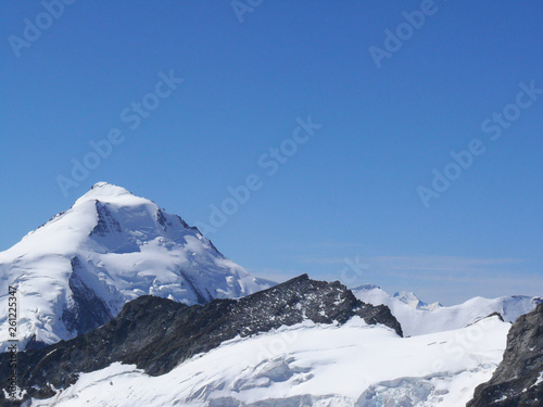 Jungfrau, Switzerland. The top of the mountain. The mountain in this photograph seems to emerge from the snow