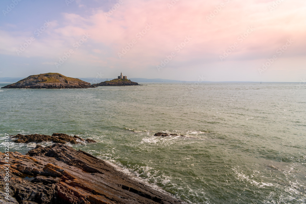 Coastal picture of the sea and a lighthouse, Mumbles, Swansea