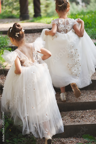 happy beautiful girls with white wedding dresses