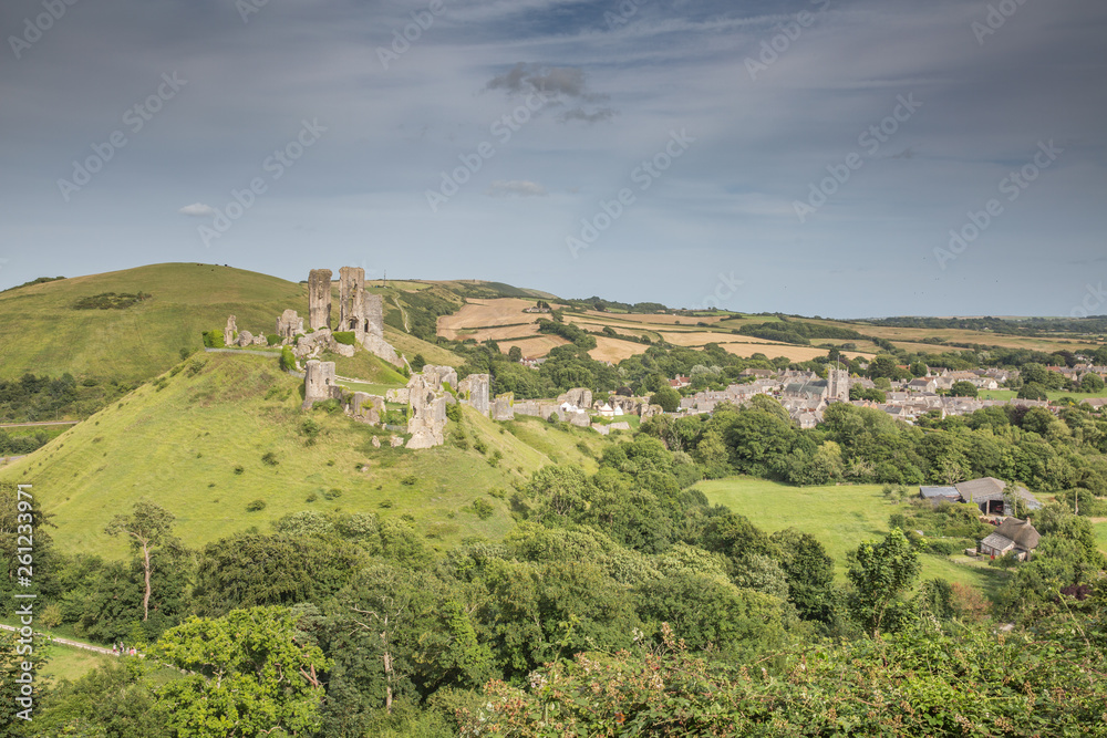 A summer view over Corfe Castle, a village and civil parish in the English county of Dorset