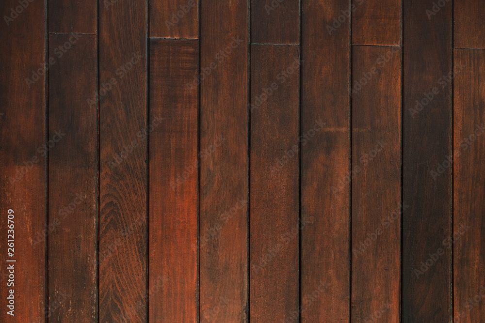 Dark brown wood texture with natural striped pattern background