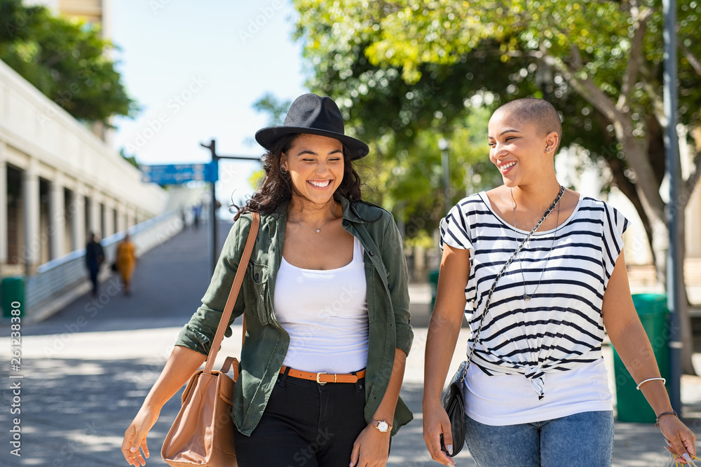 Two girls friends walking together Two girls friends walking together