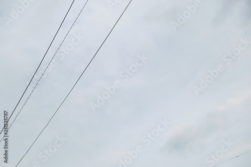 Cloudy sky and electric wire 
