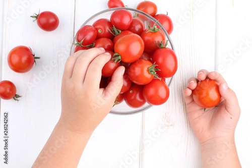 Fresh tomatoes on white backgrjund photo