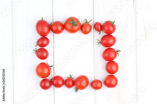 Fresh tomatoes on white backgrjund photo