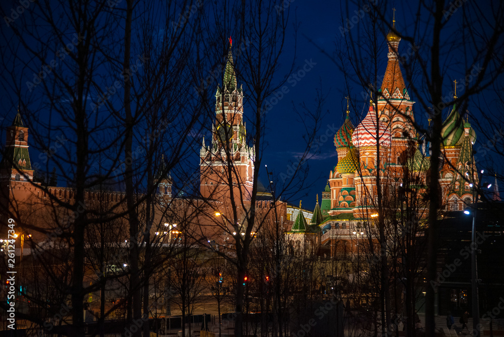 Evening walk on red square.Panorama through the trees. Evening walk on red square.Panorama through the trees.