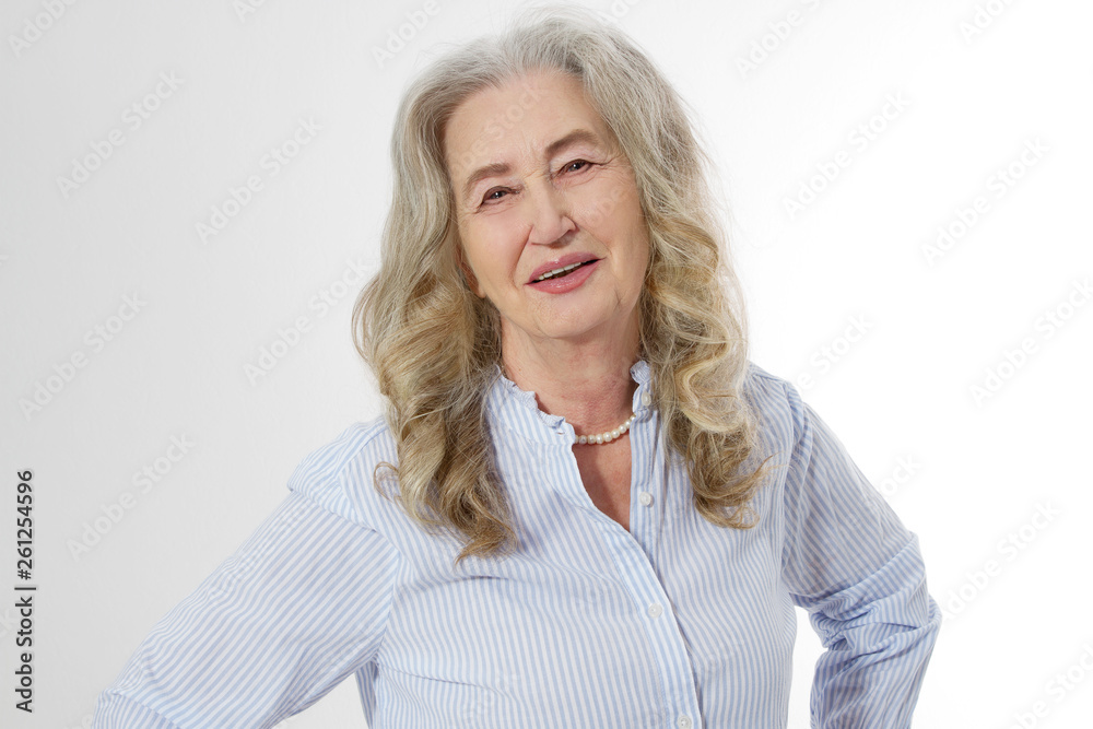 Senior woman with wrinkle face isolated on white background. Mature healthy lady. Copy space. Seniors lifestyle and old people happy concept. Senior woman with wrinkle face isolated on white background. Mature healthy lady. Copy space. Seniors lifestyle and old people happy concept.