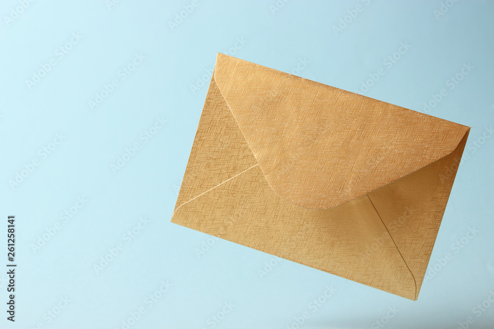 The envelope falls to the ground on a colored background. The envelope falls to the ground on a colored background.