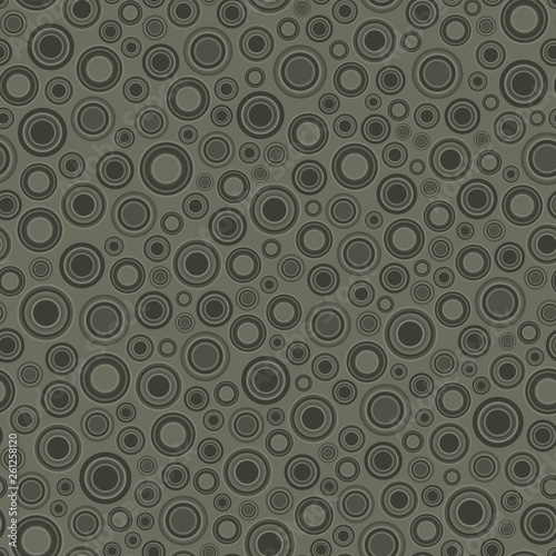 Seamless pattern, background consisting of non-overlapping geometric elements of a round shape. Useful as design element for texture and artistic compositions.