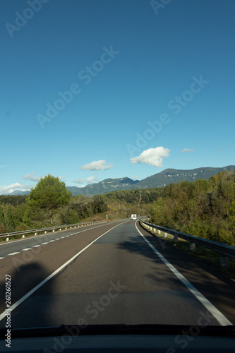 Road to the mountains on a sunny day © Lyudmyla