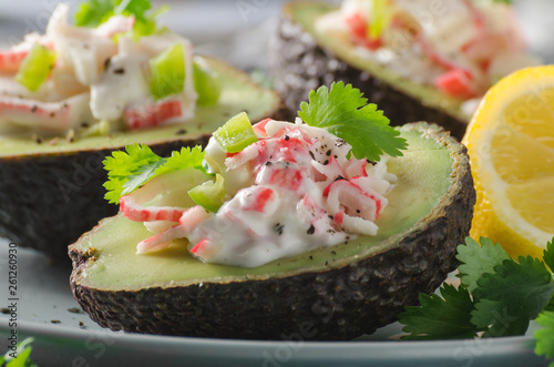 Delish filled avocado with crab meat photo