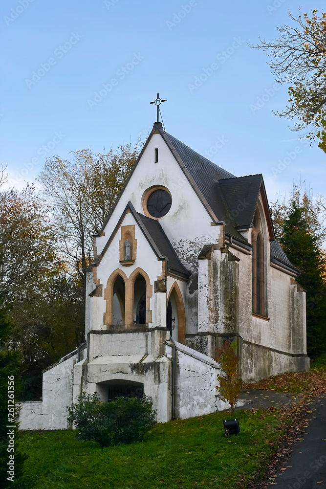 Naklejka premium White church on a hill in Belgian Ardennes