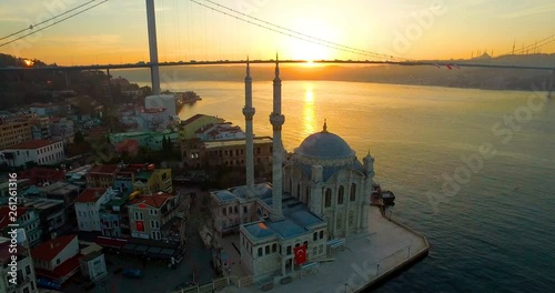 Ortakoy Mosque from sky with beautiful sunrise Bosphorus Bridge, Istanbul Turkey