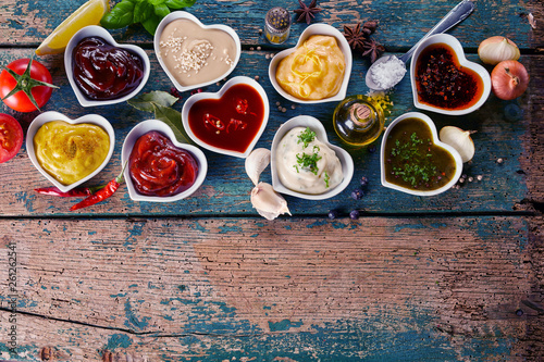 Billede på lærred Large variety of marinades, sauces and spices