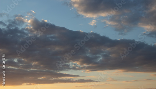 Beautiful sunset in the clouds, bright sun