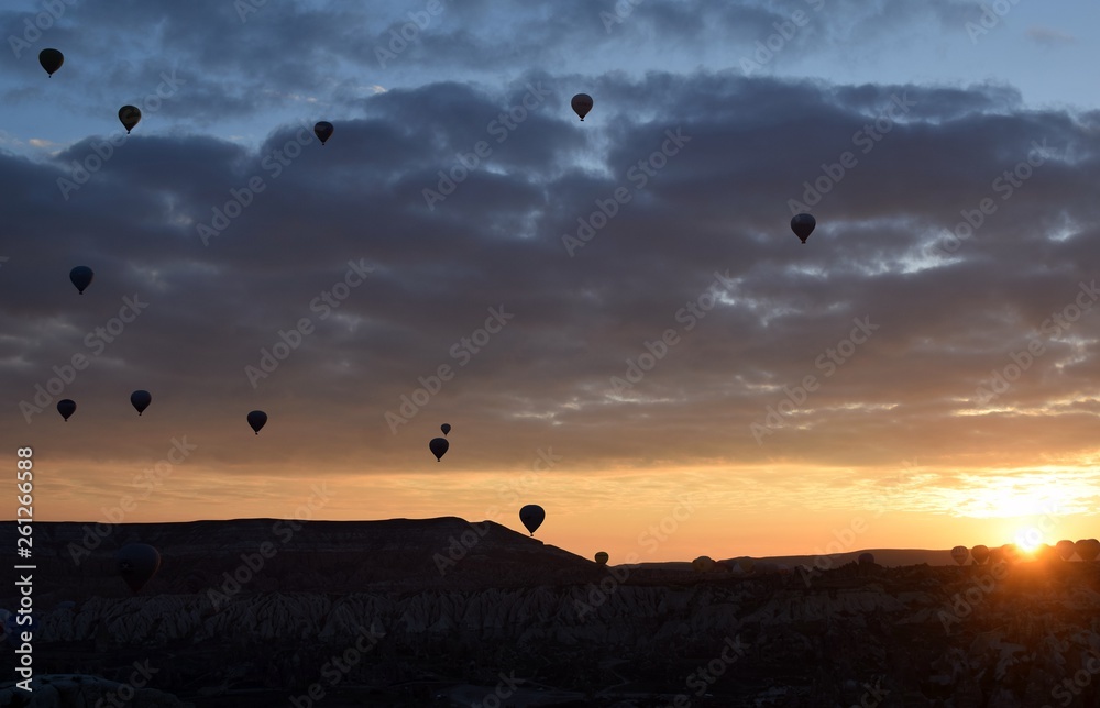 Sunrise and balloons. Beautiful background of the balloon and the sunset.Cappadocia. Turkey. Göreme. Nevşehir. Türkiye. 