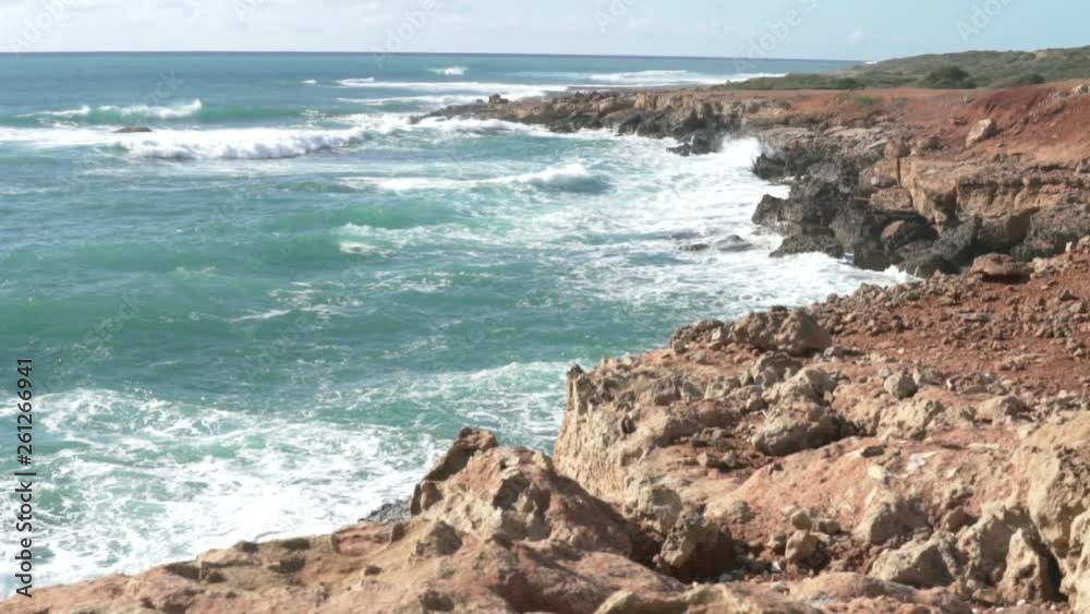 Raging sea. Waves beat on the rocks. Raging sea. Waves beat on the rocks.