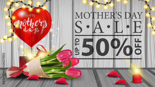 Discount banner for women's day with garland, candle, petal and bouquet of tulips
