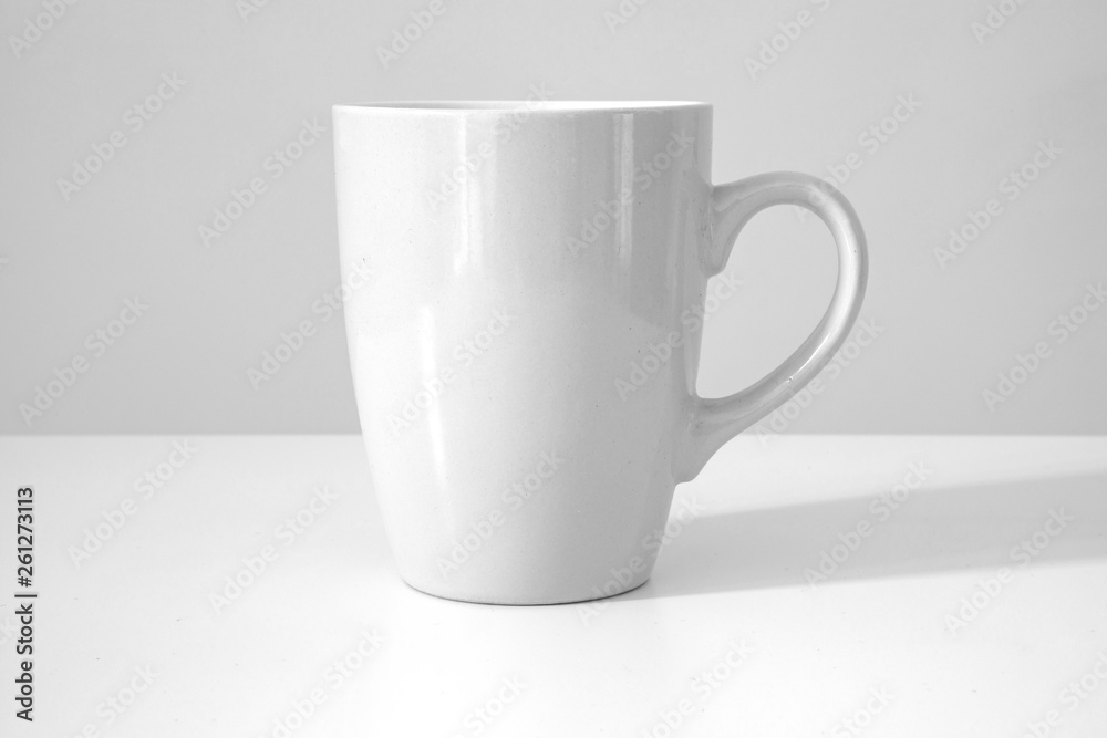 White mug on a white background. White mug on a white background.