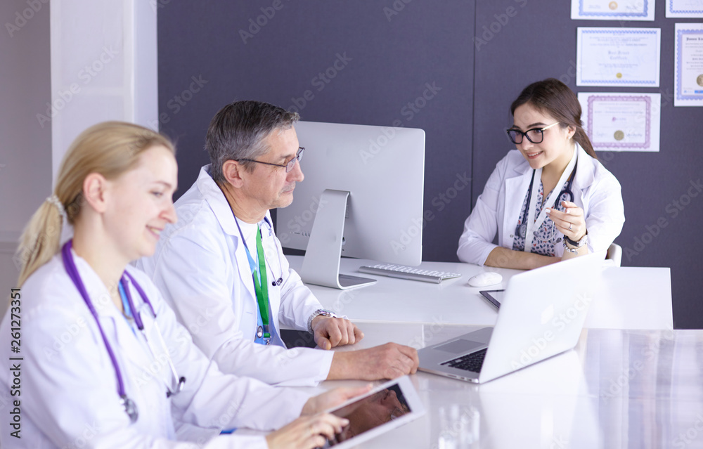 Doctors having a medical discussion in a meeting room Doctors having a medical discussion in a meeting room