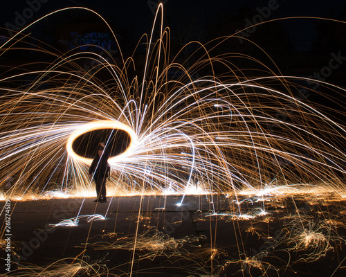 Man Spinning Steel Wool, Long Exposure