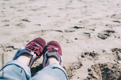 Girl relaxing on sand beach