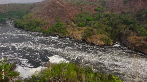 Nile River In Uganda Flows Through Sheer Rapids And Forms Raging Waterfalls