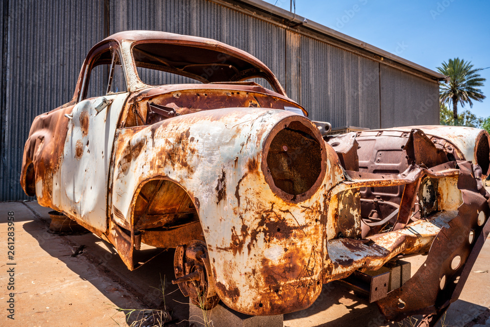 Vintage rusty car wreck in Australian red centre
